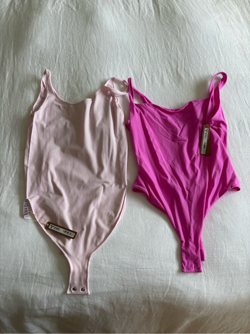 NWT Skims Bodysuits